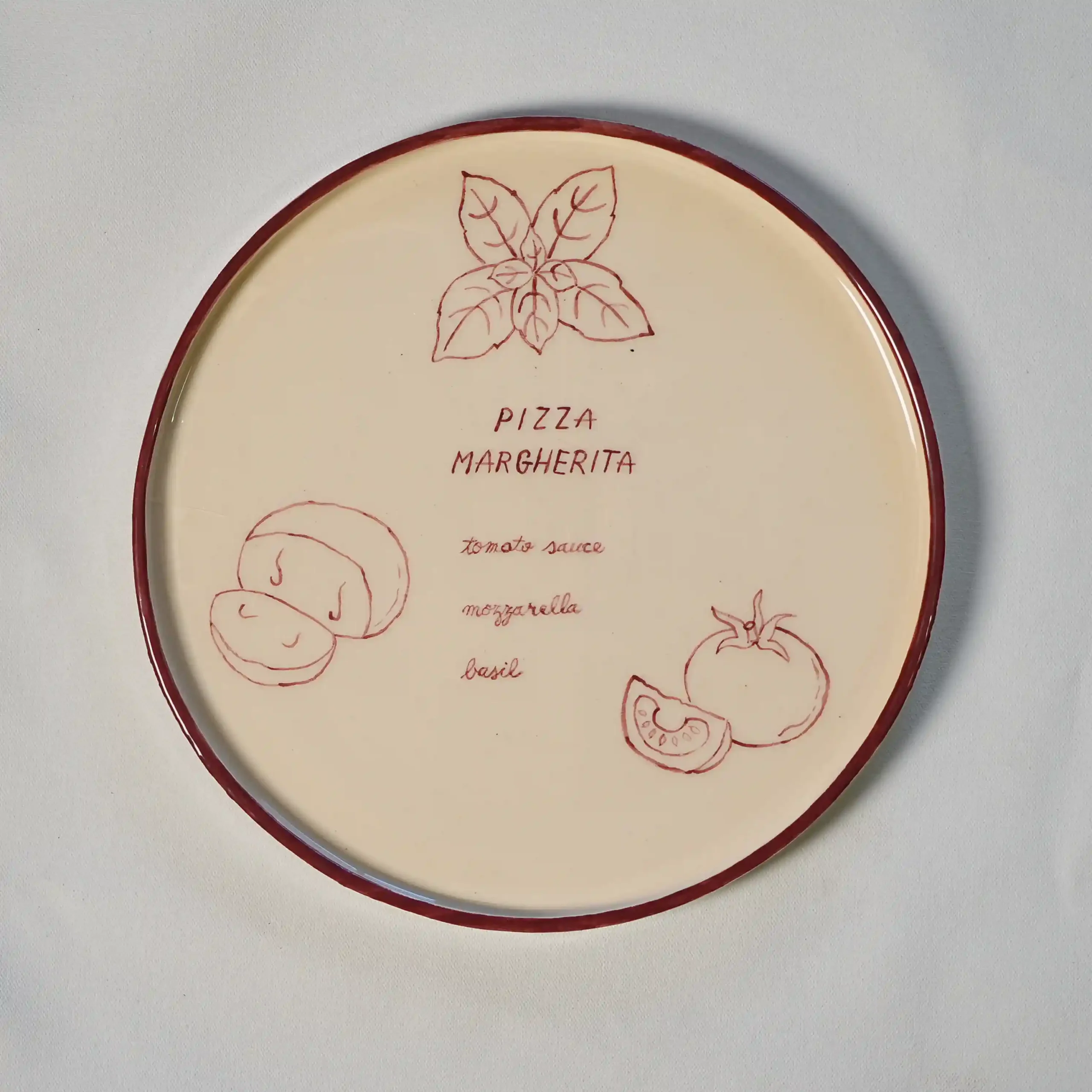 Hand-painted Margherita pizza plate viewed from above, ingredients and recipe drawn by hand